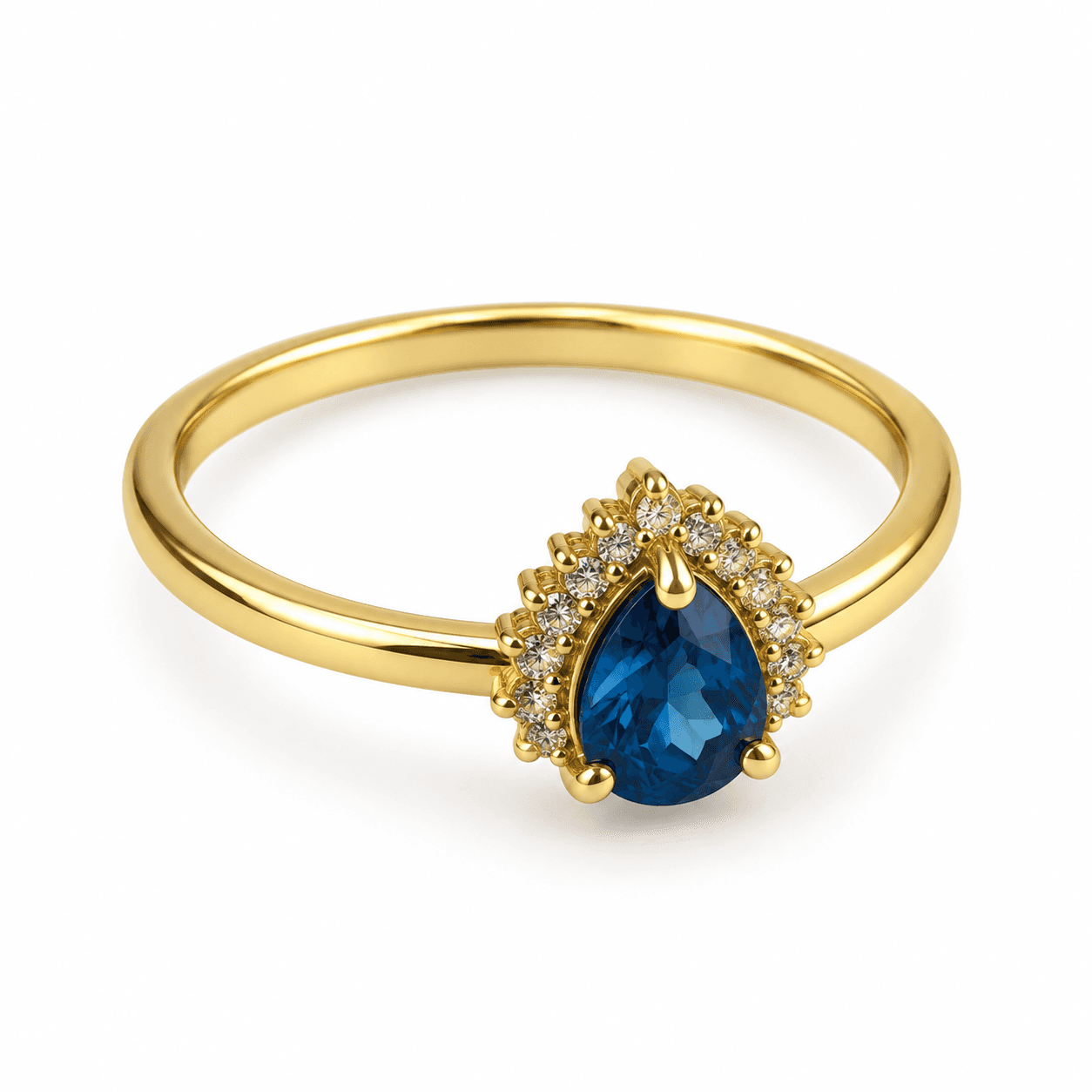 Gold-tone ring with a pear-shaped blue stone from the BeJewelled selection